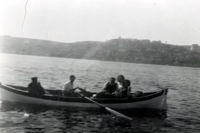 Harun Bozo with friends at an outing at sea