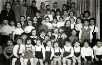 Lilly Drill watching a performance in the Jewish kindergarten