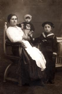 David and Mile Kalef with the woman who took care of them