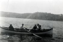 Harun Bozo with friends at an outing at sea
