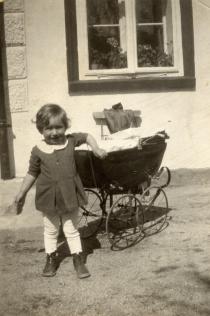 Alena Munkova at home in the courtyard