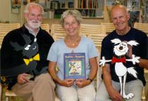 Alena Munkova with her husband Jiri Munk and an artist at a book launch